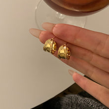 Boucles d'oreilles créoles irrégulières à larges bords 