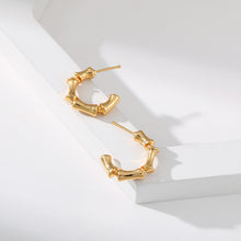 Boucles d'oreilles géométriques en forme de C 