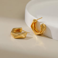 Boucles d'oreilles lisses et irrégulières 