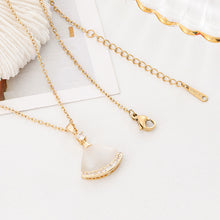 Shell skirt pendant necklace