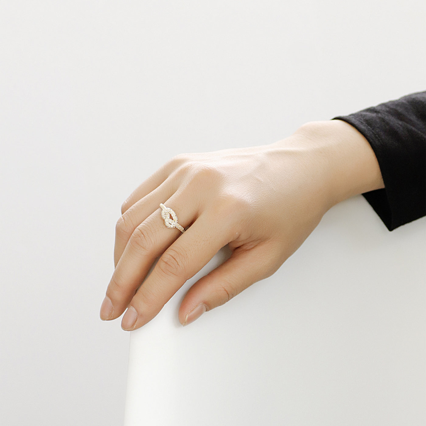 Chain knotted diamond ring