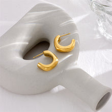Boucles d'oreilles géométriques en forme de U 