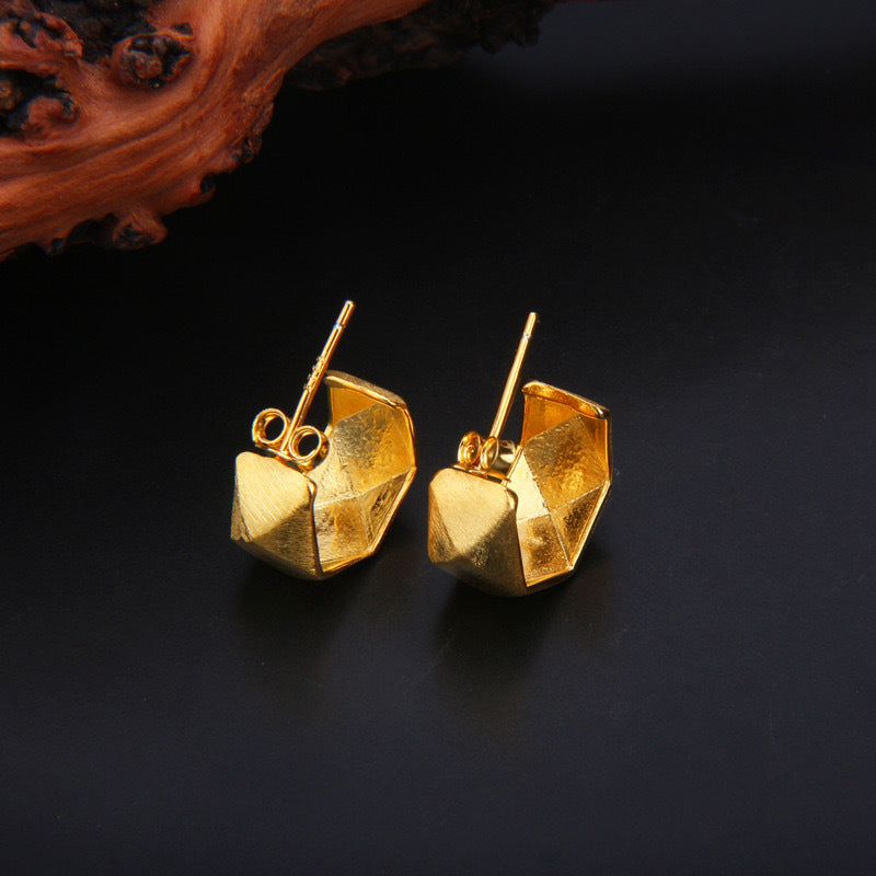 Stylish earrings with a pleated texture