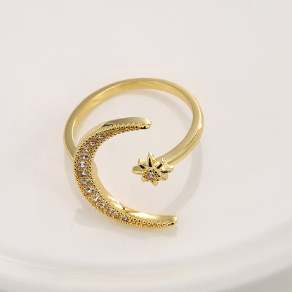 Crescent diamond-encrusted open tail ring