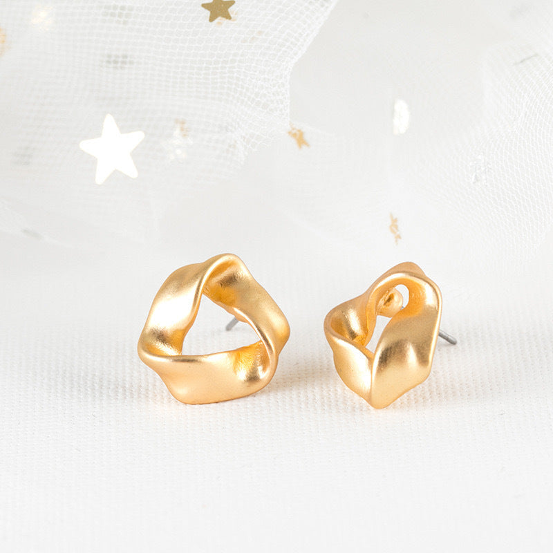 Boucles d'oreilles creuses torsadées 