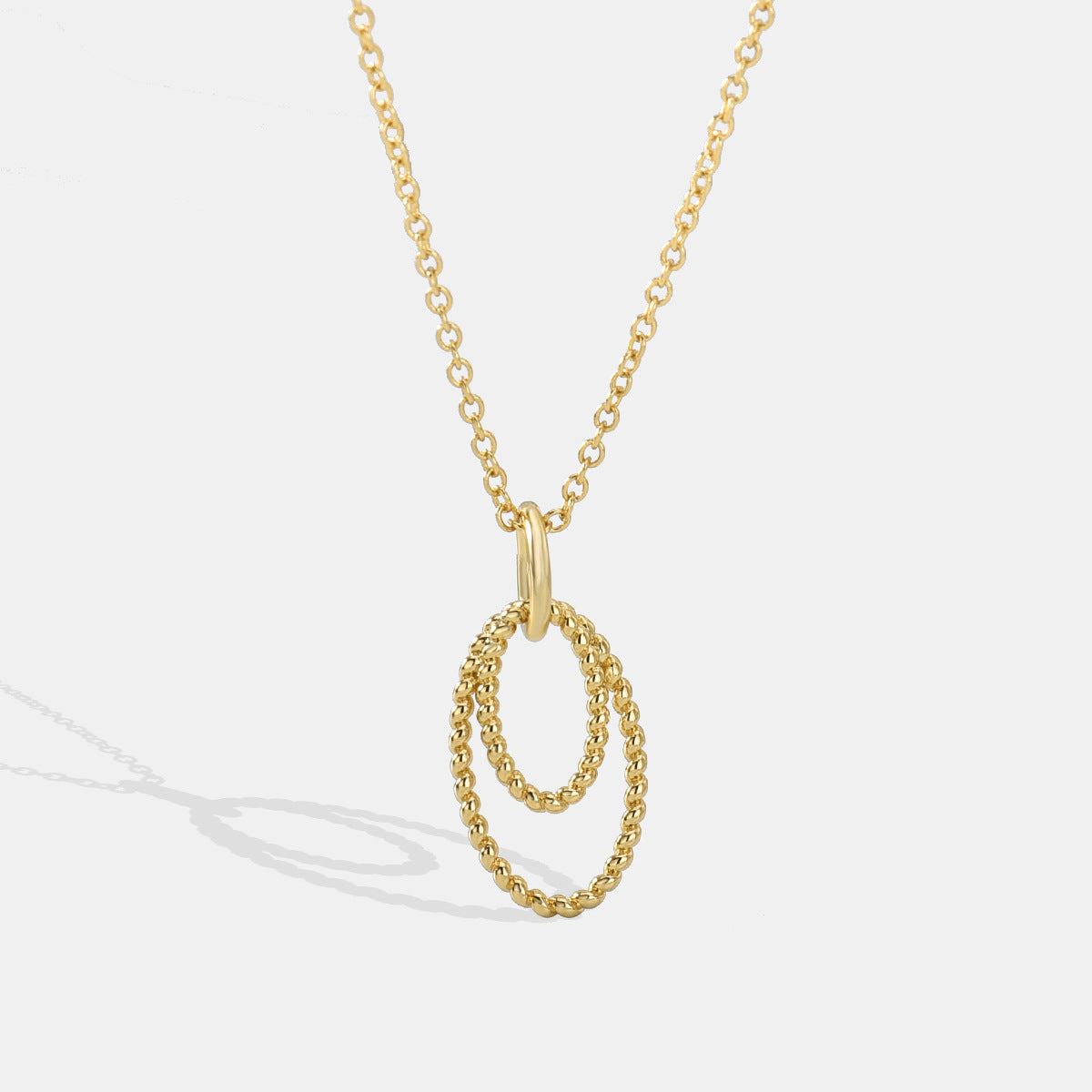 Collier simple pop à double anneau 