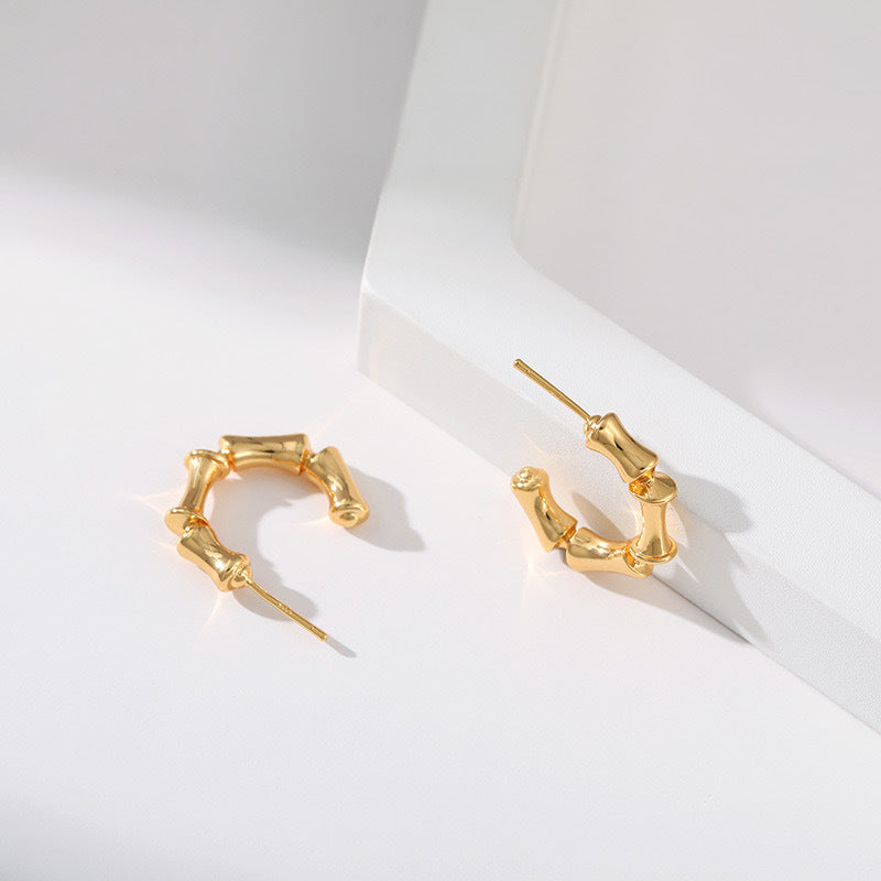 Boucles d'oreilles géométriques en forme de C 