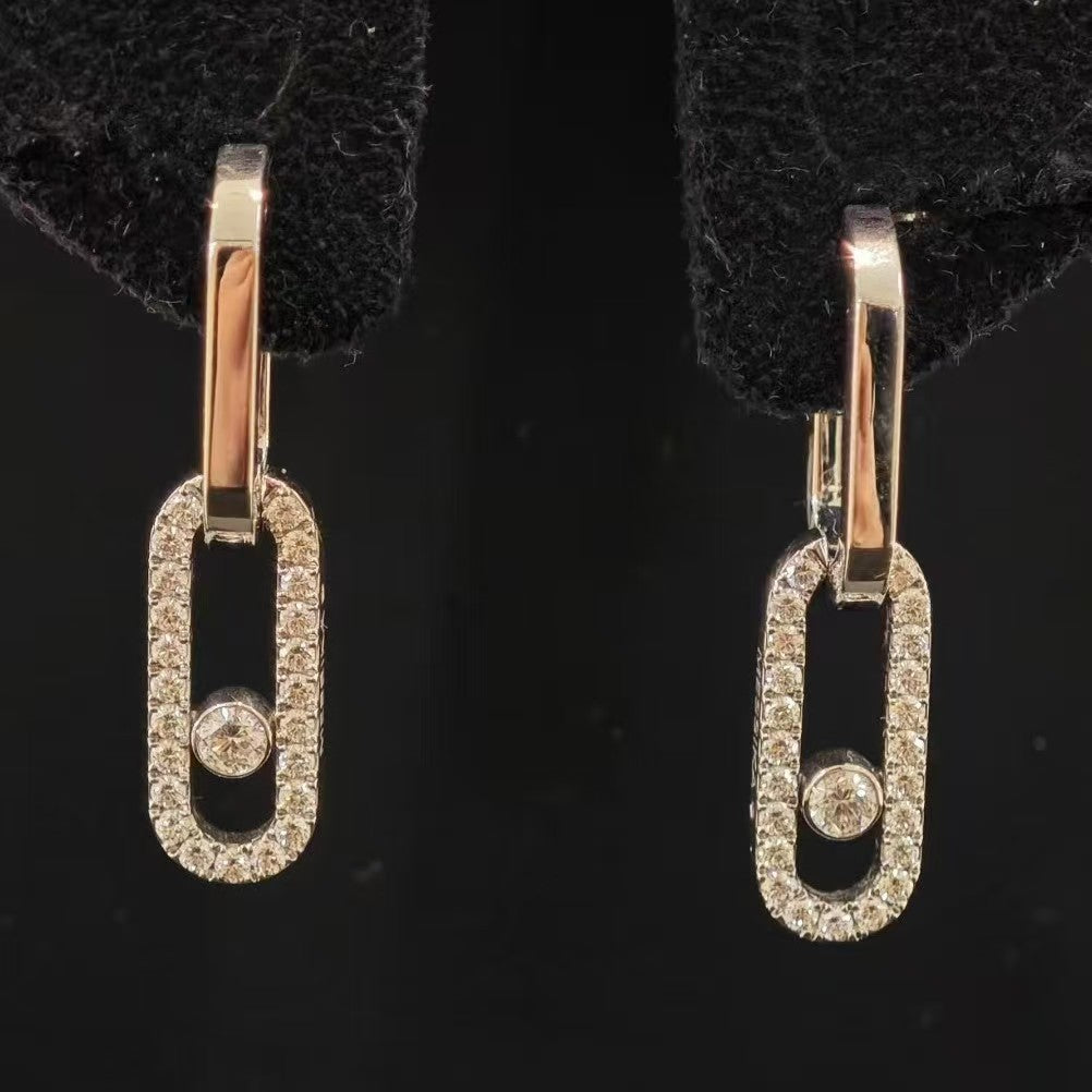 Rose gold-tone pavé CZ open link drop earrings on black display