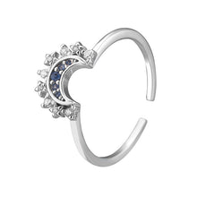 Silver-tone adjustable open ring with a moon motif on a white background