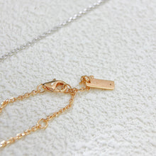 Rose gold-tone necklace lobster clasp and adjustable O-link chain detail
