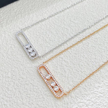 Three-stone CZ sliding bar necklaces with pavé frames in silver and rose gold tones