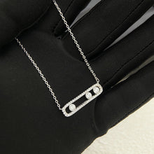 Silver-tone pavé CZ sliding bar necklace with three stones