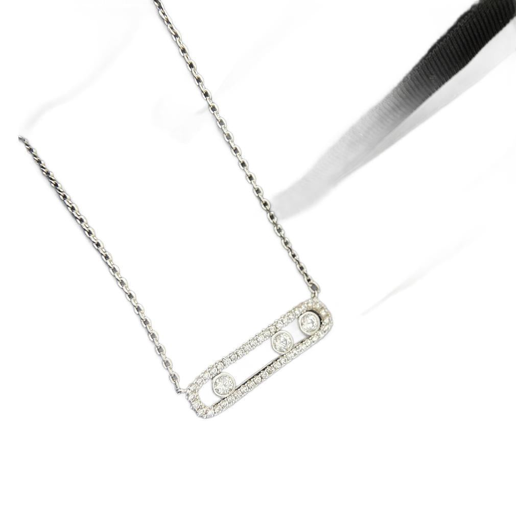 Silver-tone three-stone pavé CZ sliding bar necklace on white