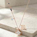 Crystal Star Charm Necklace in Rose Gold Tone