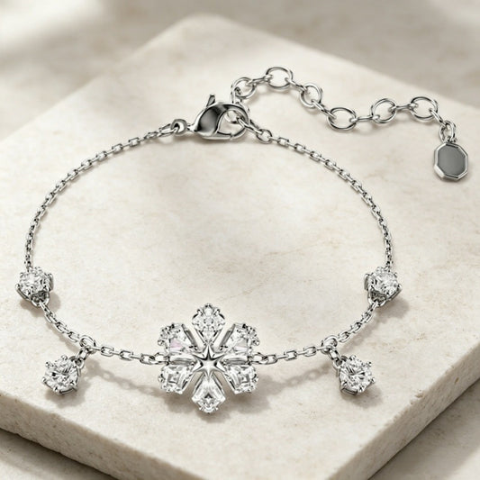 Crystal Snowflake Charm Bracelet in Silver Tone