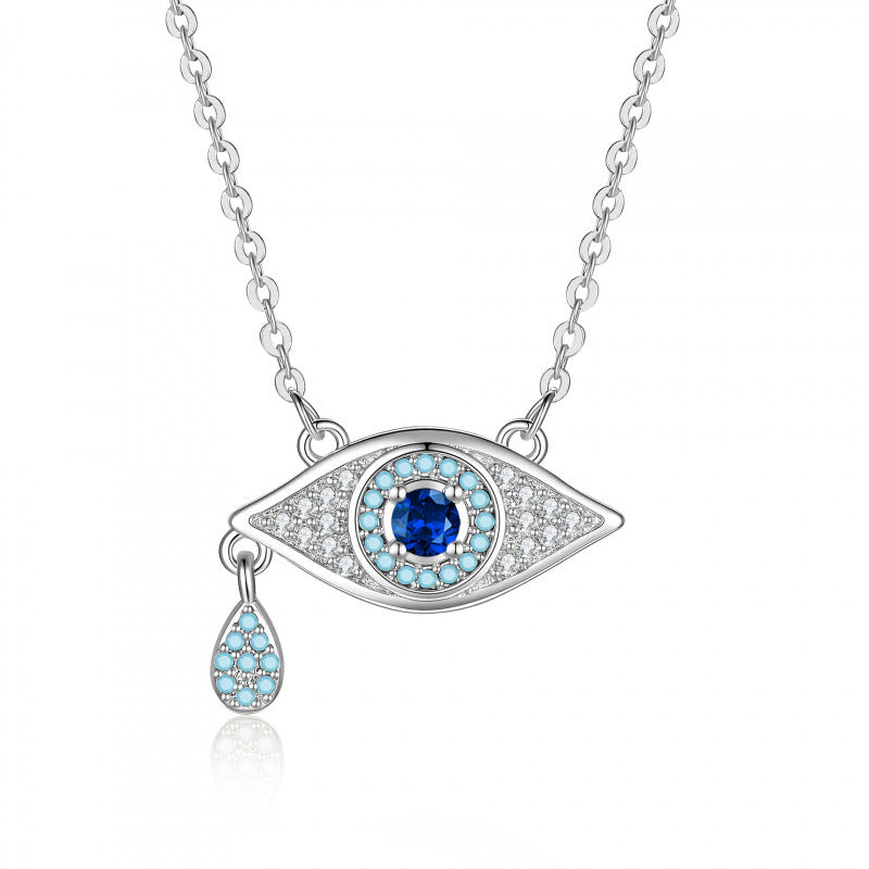 Silver tone blue crystal evil eye pendant necklace with dangling charm