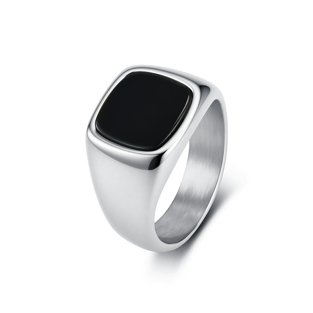 Silver tone men's stainless steel signet ring with natural black stone