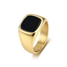 Gold tone men's stainless steel signet ring with natural black stone