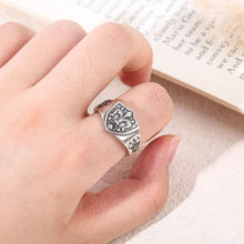 Antique Silver adjustable fleur-de-lis shield ring worn on hand