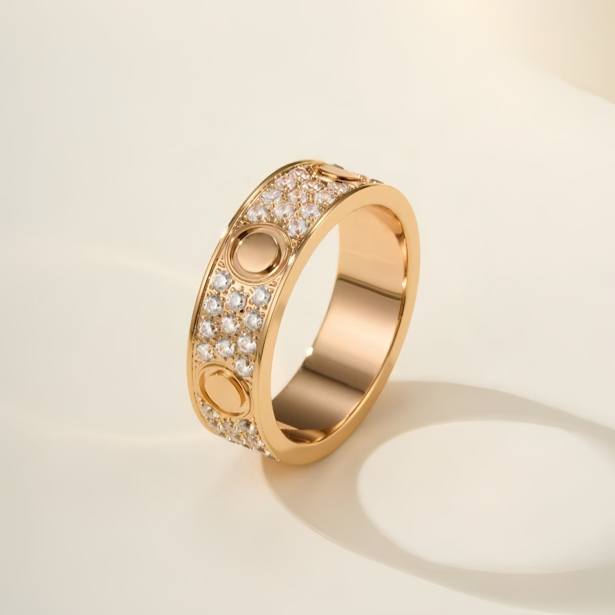 Rose-gold-tone three-row pave circle-motif ring on an ivory background - photo 05