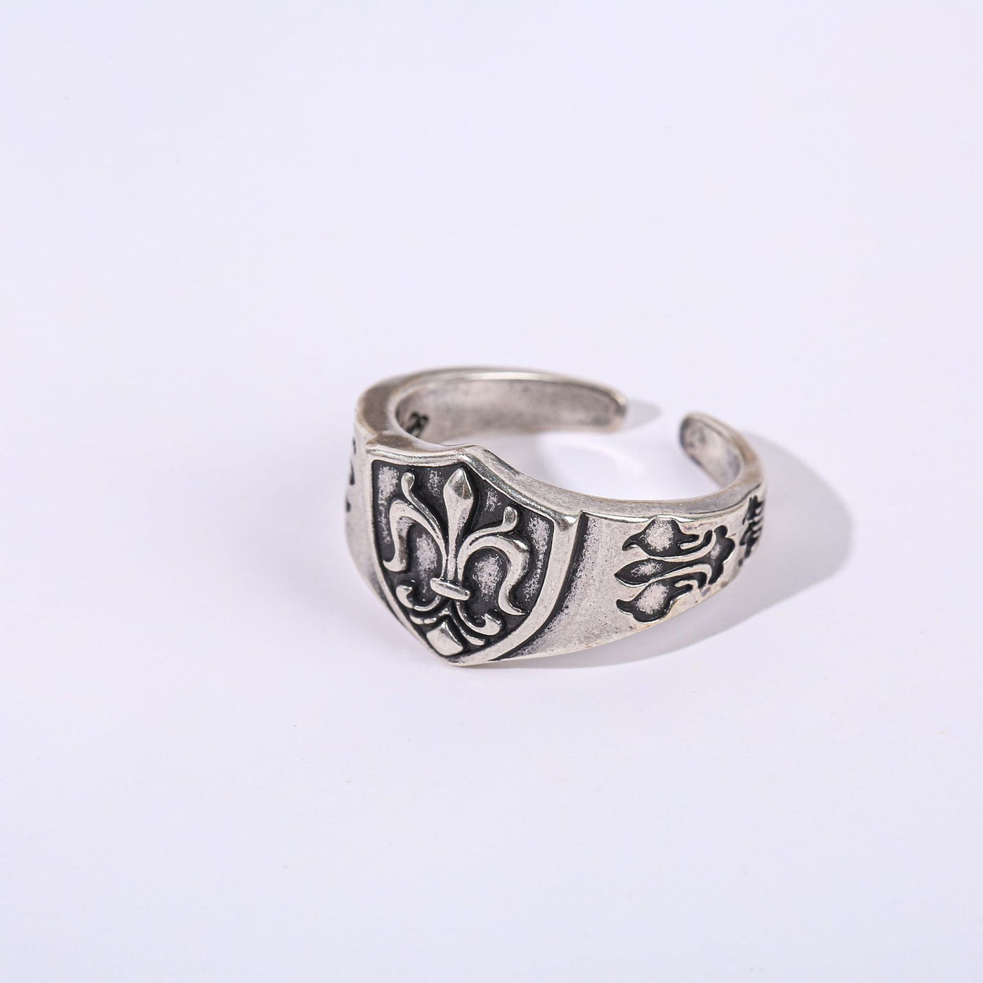 Antique Silver fleur-de-lis shield open ring on a white background