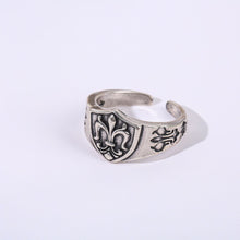 Antique Silver fleur-de-lis shield open ring on a white background