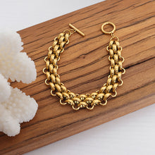 Gold tone chunky toggle chain bracelet detail