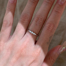 Dainty cubic zirconia pinky ring shown on hand