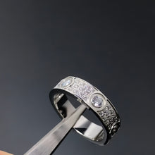 Silver-tone round-set cubic zirconia band ring angled view - photo 24