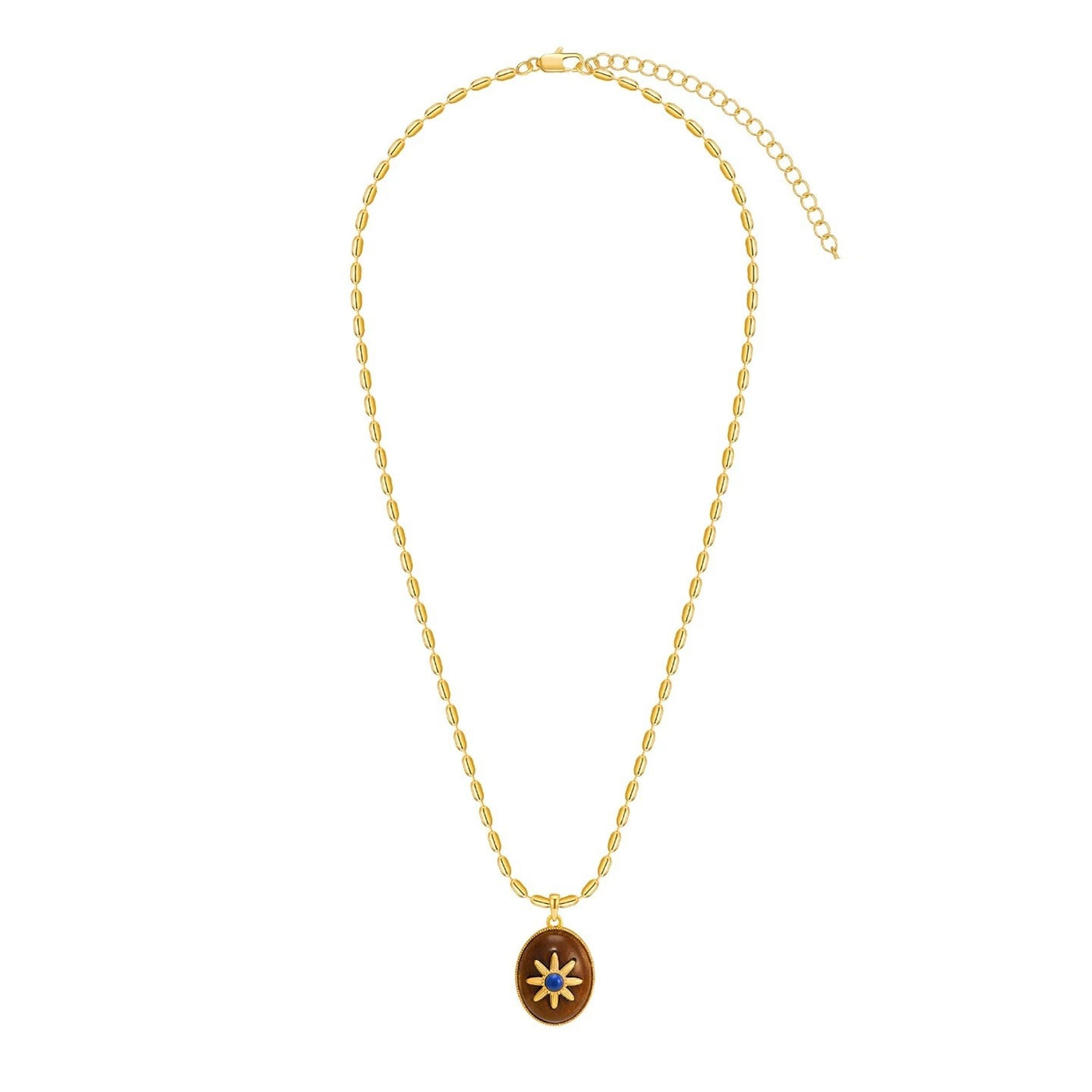 Gold tone link necklace with oval wood sun pendant and blue center stone