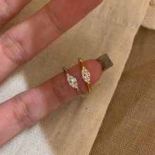 Marquise cubic zirconia rings in gold and silver tones