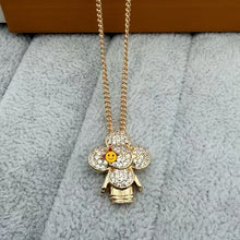 Rose Gold Tone pave flower doll pendant necklace with a smiley photo overlay - photo 08