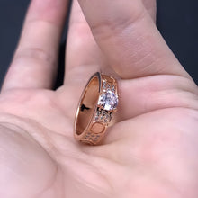 Rose-gold-tone raised solitaire ring on a display cushion - photo 10
