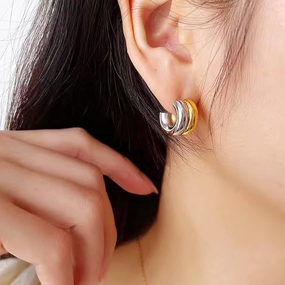 Two tone layered C-hoop stud earrings styled on ear