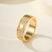 Gold-tone three-row pave circle-motif band ring on an ivory background - photo 48