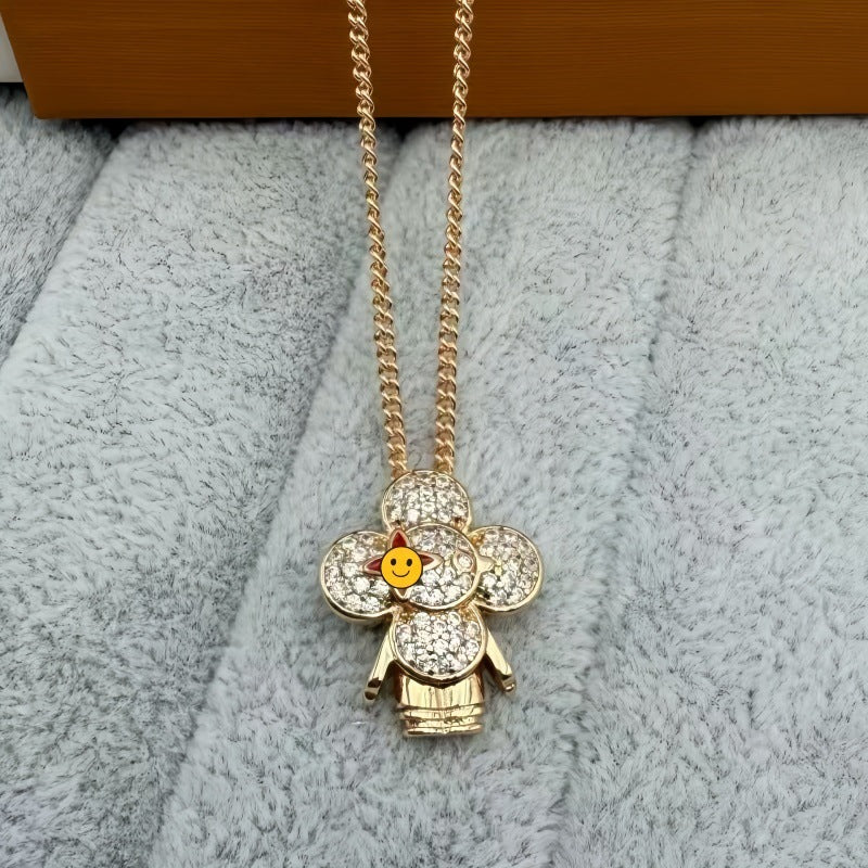 Rose Gold Tone pave flower doll pendant necklace with a smiley photo overlay - photo 01
