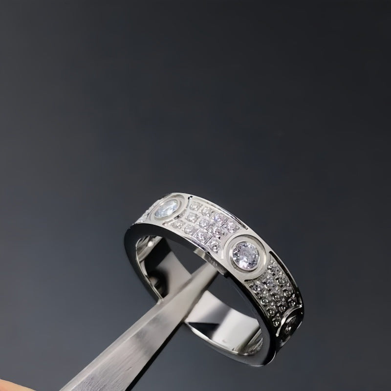 Silver-tone round-set cubic zirconia band ring dark background - photo 65