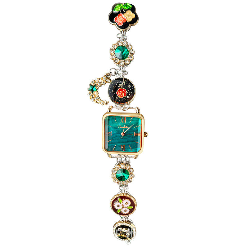 Supplier reference of Forest Green square bracelet watch with floral enamel disks, green stones and crescent charm