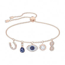 Lucky symbol evil eye charm bracelet in rose gold tone