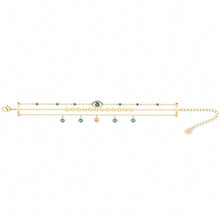 Layered turquoise crystal evil eye charm bracelet in gold tone