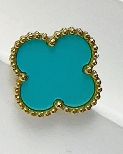 Close-up of an Aqua Blue four-leaf clover stud showing its colored center and gold-tone beaded border.