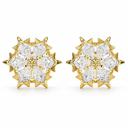 Pair of gold-tone snowflake stud earrings with six clear crystal sectors on white