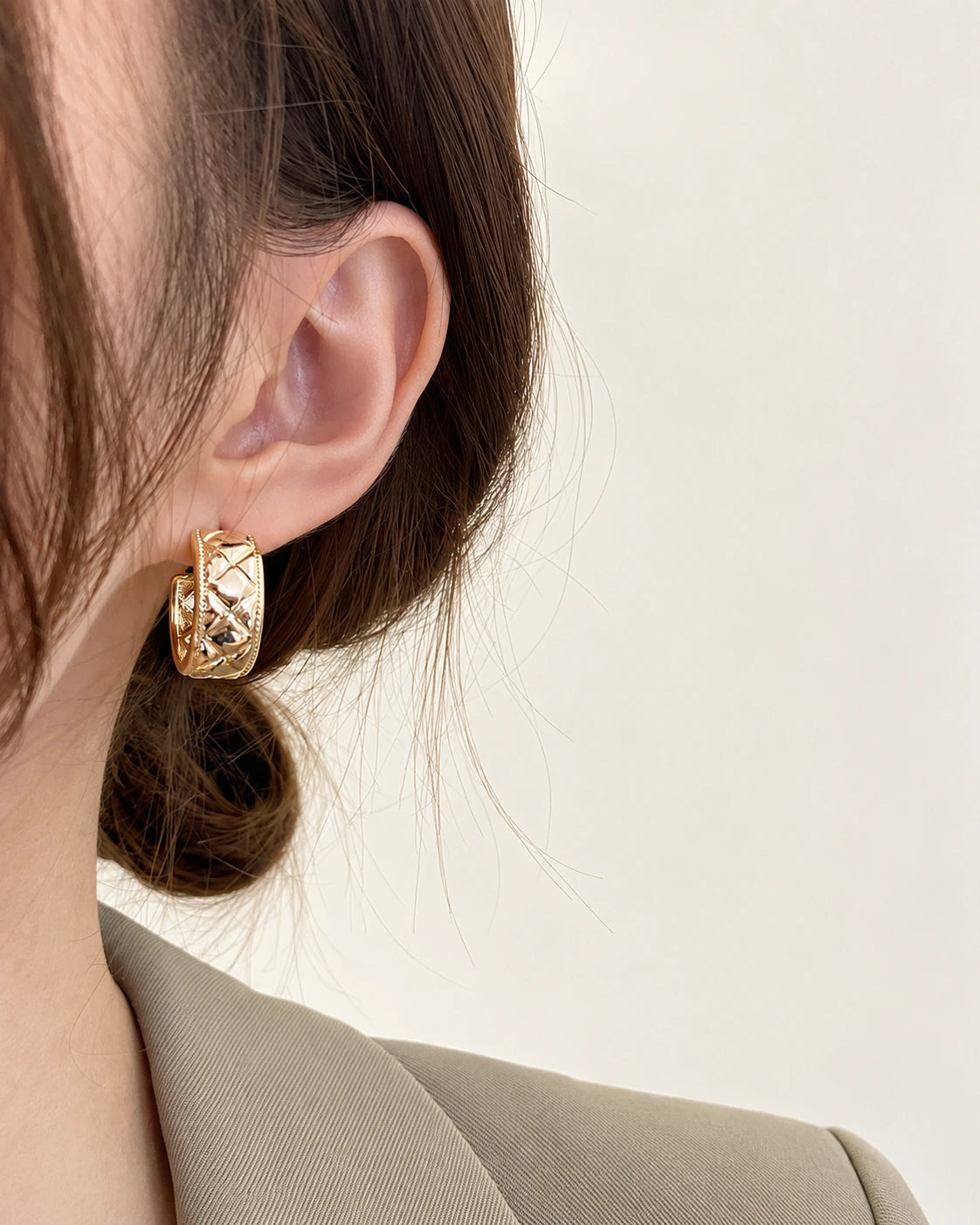 Textured Half-Hoop Earrings worn on an adult model
