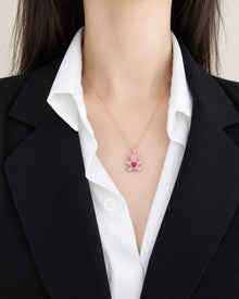 Beating Heart Teddy Bear Crystal Pendant Necklace worn on an adult model
