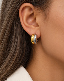 Stainless Steel C-Hoop Earrings worn on an adult model