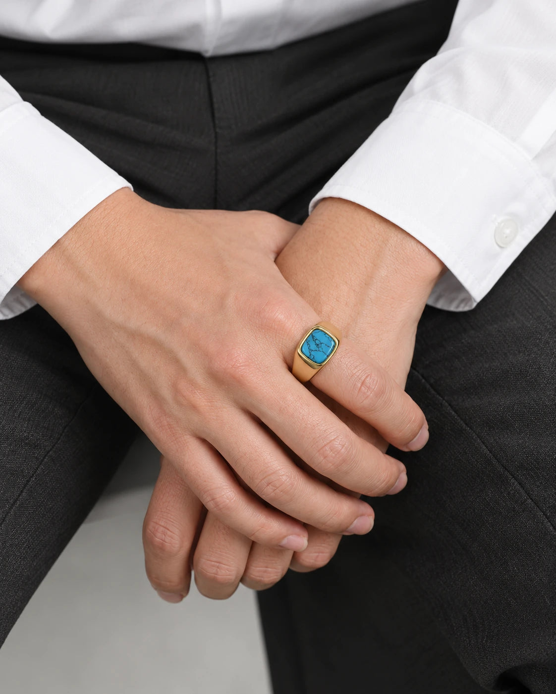 Men’s Stainless Steel Signet Ring worn on an adult model