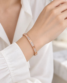 Stainless Steel Screw Motif Hinged Bangle Bracelet worn on an adult model