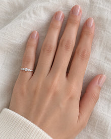 Five-Stone Cubic Zirconia Pinky Ring - US Sizes 3 & 4 worn on an adult model