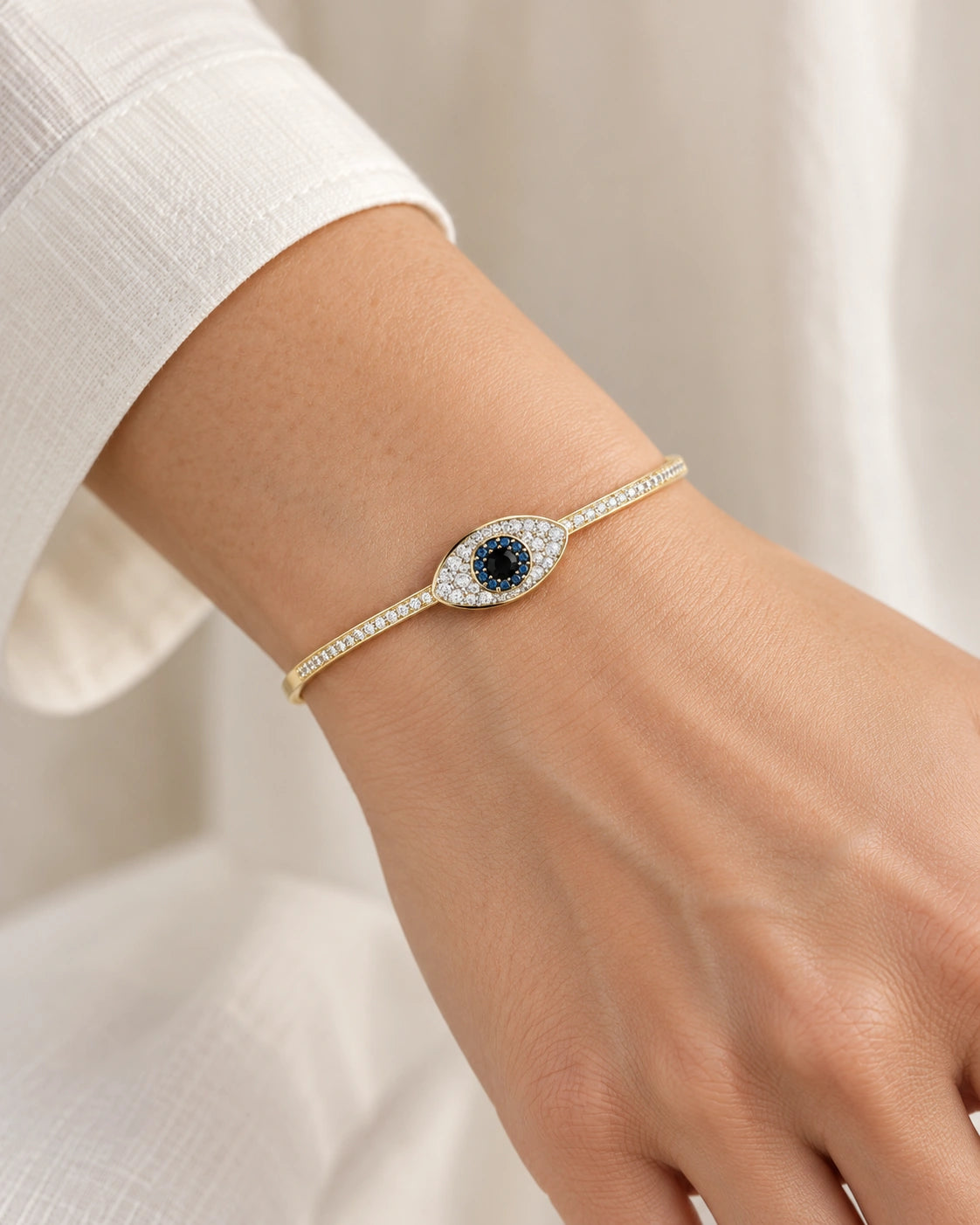 Blue Evil Eye Bangle Bracelet – Gold Tone – model wearing view