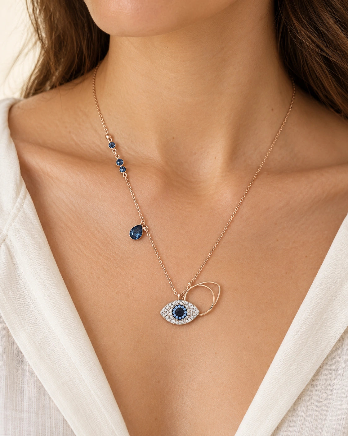 Blue Evil Eye & Teardrop Charm Necklace – Rose Gold Tone – model wearing view